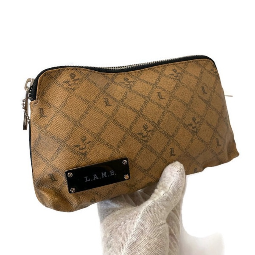 Lamb clutch/makeup case